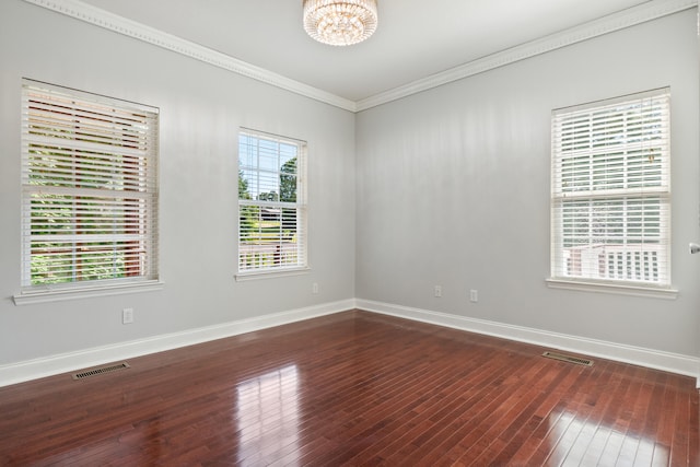 1502 Brock Cir, Ringgold, GA 30736 - unfurnished room with a chandelier, dark wood-style flooring, and ornamental molding