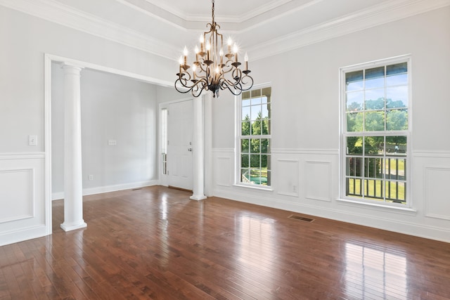 1502 Brock Cir, Ringgold, GA 30736 - unfurnished room with decorative columns, a decorative wall, wood-type flooring, a chandelier, and a wainscoted wall