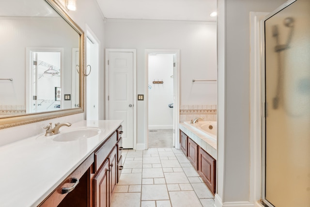 1502 Brock Cir, Ringgold, GA 30736 - full bathroom featuring a stall shower, a bath, vanity, crown molding, and tile patterned flooring