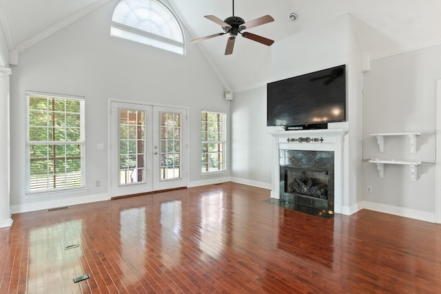 1502 Brock Cir, Ringgold, GA 30736 - unfurnished living room featuring high vaulted ceiling, a high end fireplace, ceiling fan, healthy amount of natural light, and wood finished floors