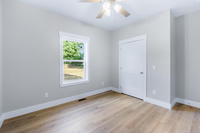 307 Cavender St, Lafayette, GA 30728 - unfurnished bedroom with light wood-style floors and a ceiling fan