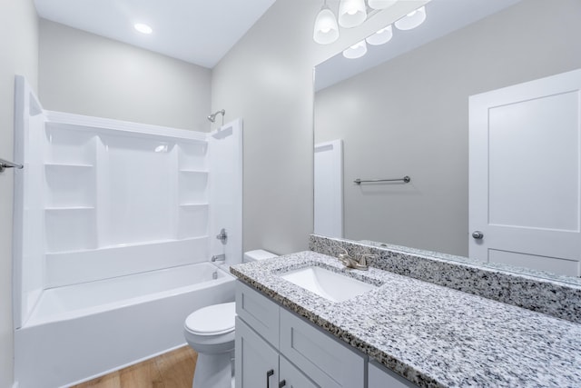 307 Cavender St, Lafayette, GA 30728 - bathroom featuring vanity, wood finished floors, and bathtub / shower combination