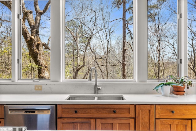 1908 Clear Brooks Dr, Signal Mountain, TN 37377 - kitchen with dishwasher, light countertops, and brown cabinets