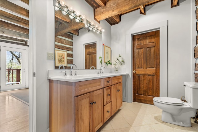 1908 Clear Brooks Dr, Signal Mountain, TN 37377 - bathroom with beamed ceiling, double vanity, and tile patterned floors