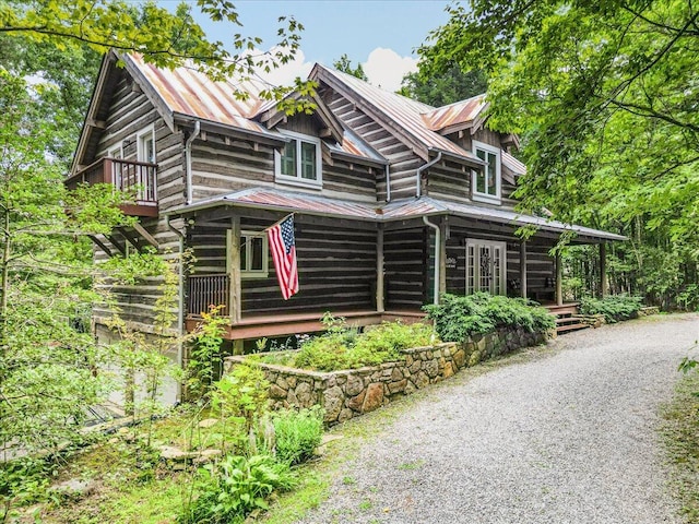 1908 Clear Brooks Dr, Signal Mountain, TN 37377 - log home with a metal roof and gravel driveway