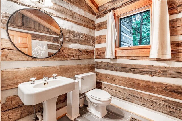 1908 Clear Brooks Dr, Signal Mountain, TN 37377 - bathroom with wood walls and tile patterned floors