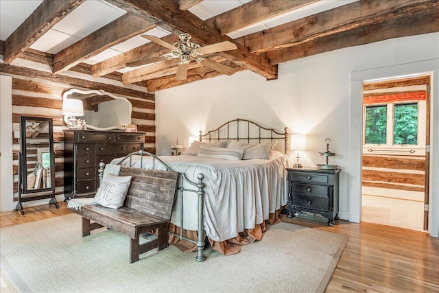 1908 Clear Brooks Dr, Signal Mountain, TN 37377 - bedroom featuring wood finished floors, beam ceiling, and ensuite bath