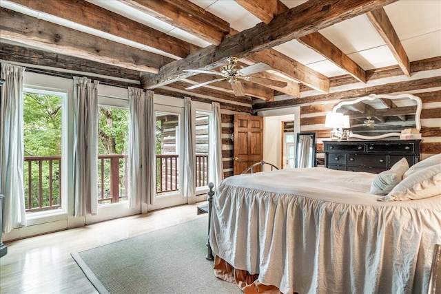 1908 Clear Brooks Dr, Signal Mountain, TN 37377 - bedroom featuring access to outside, beam ceiling, wood finished floors, and wood walls