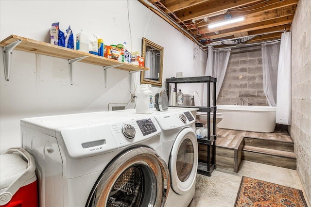 1908 Clear Brooks Dr, Signal Mountain, TN 37377 - washroom with washer and clothes dryer and concrete block wall