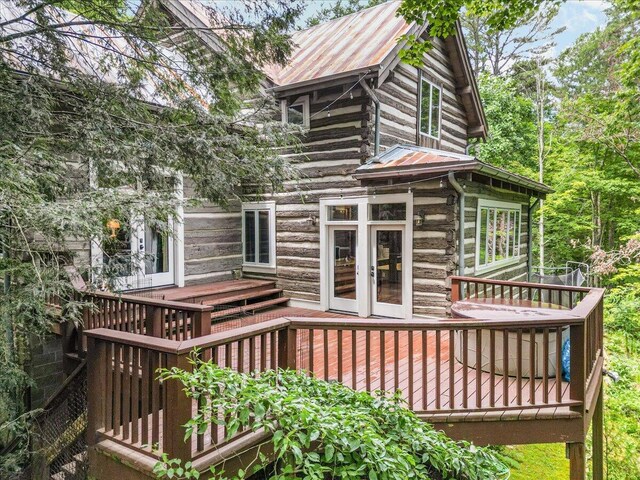 1908 Clear Brooks Dr, Signal Mountain, TN 37377 - rear view of house with log siding, french doors, a deck, and a metal roof
