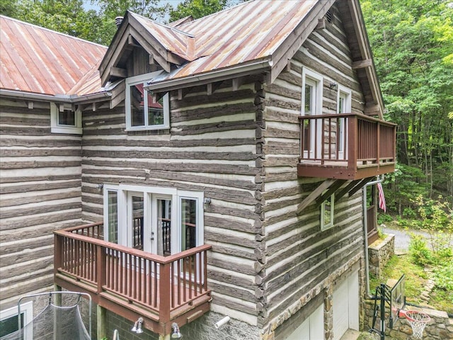 1908 Clear Brooks Dr, Signal Mountain, TN 37377 - view of property exterior with a balcony, a metal roof, and log exterior