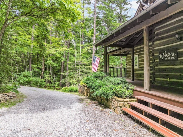 1908 Clear Brooks Dr, Signal Mountain, TN 37377 - view of yard featuring gravel driveway and a porch