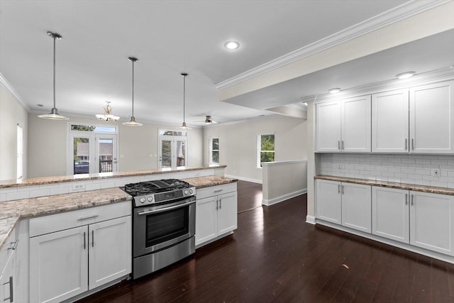 1120 Valentine Cir, Chattanooga, TN 37405 - kitchen with stainless steel gas range, crown molding, white cabinetry, backsplash, and dark wood-type flooring