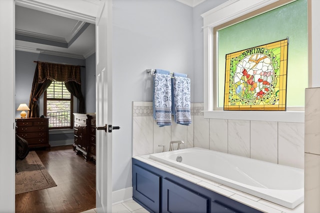 9795 Trestle Cir, Ooltewah, TN 37363 - full bathroom featuring crown molding, a bath, and wood finished floors
