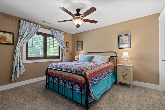 9795 Trestle Cir, Ooltewah, TN 37363 - carpeted bedroom featuring baseboards and a ceiling fan