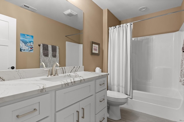 9795 Trestle Cir, Ooltewah, TN 37363 - full bath with vanity, shower / tub combo with curtain, and wood finished floors