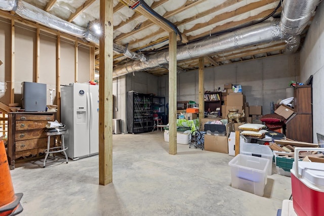 9795 Trestle Cir, Ooltewah, TN 37363 - unfinished below grade area featuring white refrigerator with ice dispenser