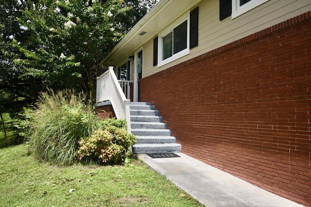 268 Lawrence Dr, Rossville, GA 30741 - entrance to property featuring brick siding and a lawn