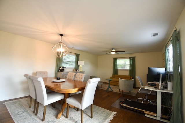 268 Lawrence Dr, Rossville, GA 30741 - dining room with dark wood-style flooring, ceiling fan, and a chandelier