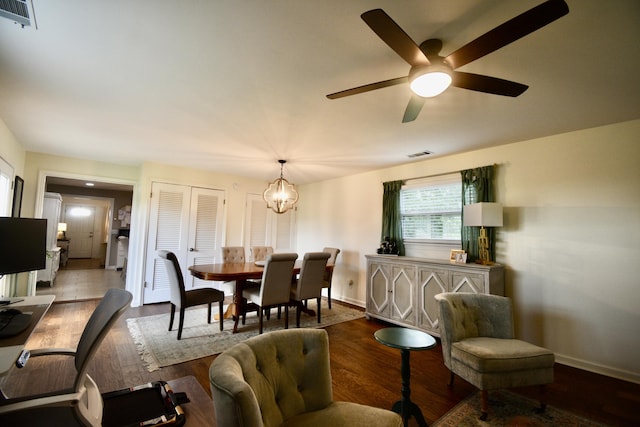 268 Lawrence Dr, Rossville, GA 30741 - dining space featuring wood finished floors, a ceiling fan, and a chandelier