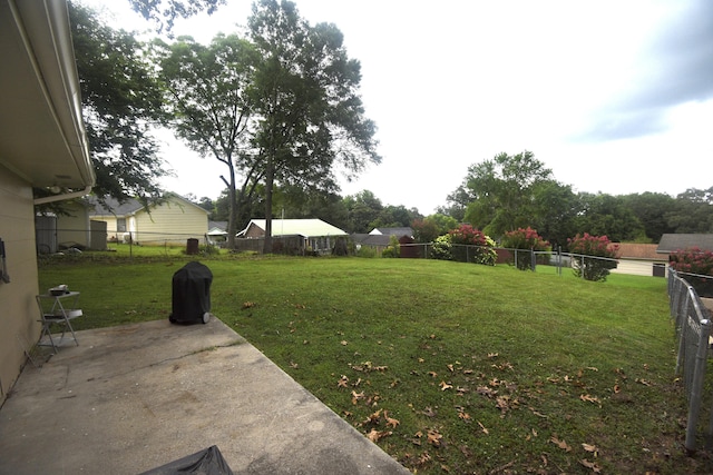 268 Lawrence Dr, Rossville, GA 30741 - fenced backyard featuring a patio