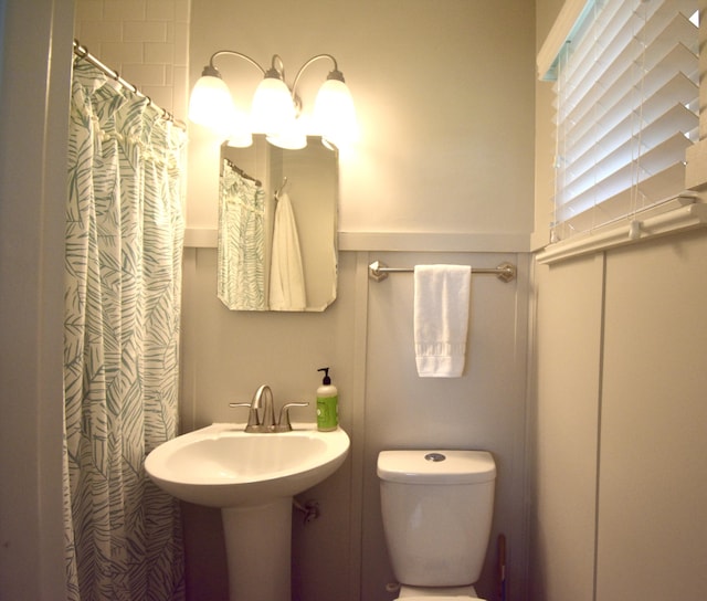 268 Lawrence Dr, Rossville, GA 30741 - bathroom featuring toilet and a shower with shower curtain