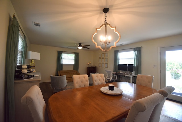 268 Lawrence Dr, Rossville, GA 30741 - dining area featuring a chandelier, wood finished floors, healthy amount of natural light, and a ceiling fan