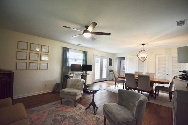 268 Lawrence Dr, Rossville, GA 30741 - living room with a ceiling fan, a chandelier, and dark wood-style flooring