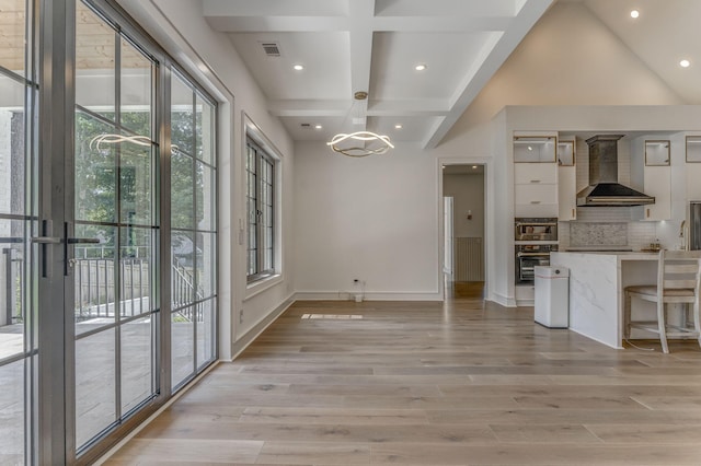 807 Judd Ter, Dalton, GA 30720 - unfurnished dining area with a chandelier, recessed lighting, plenty of natural light, light wood finished floors, and beamed ceiling