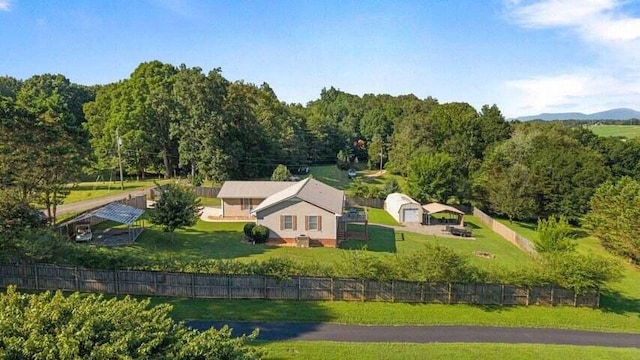 346 Thomas Rd, Benton, TN 37307 - view from above of property with a heavily wooded area