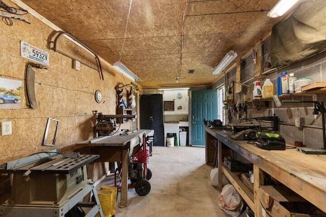 346 Thomas Rd, Benton, TN 37307 - misc room featuring a workshop area and concrete flooring