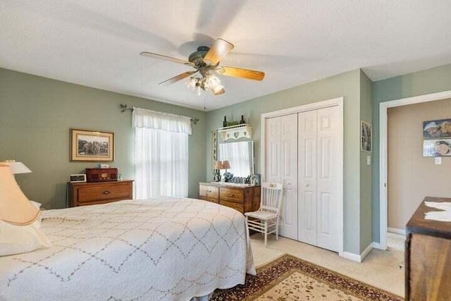346 Thomas Rd, Benton, TN 37307 - carpeted bedroom featuring a closet and ceiling fan