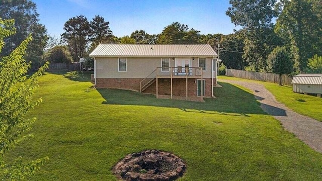 346 Thomas Rd, Benton, TN 37307 - back of house featuring stairs, a wooden deck, and a metal roof