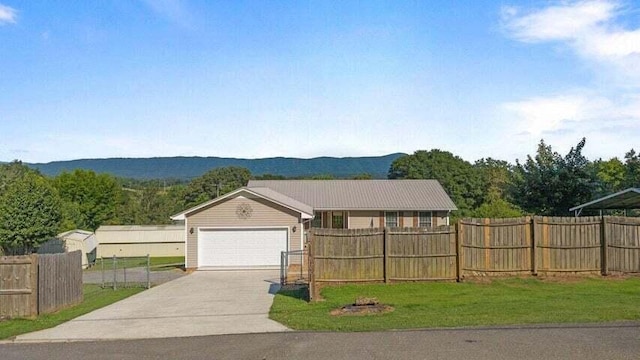 346 Thomas Rd, Benton, TN 37307 - single story home with driveway and a garage