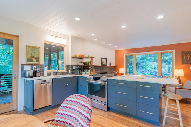 4205 Seneca Ave, Chattanooga, TN 37409 - kitchen featuring stainless steel appliances, a peninsula, blue cabinetry, backsplash, and wooden ceiling