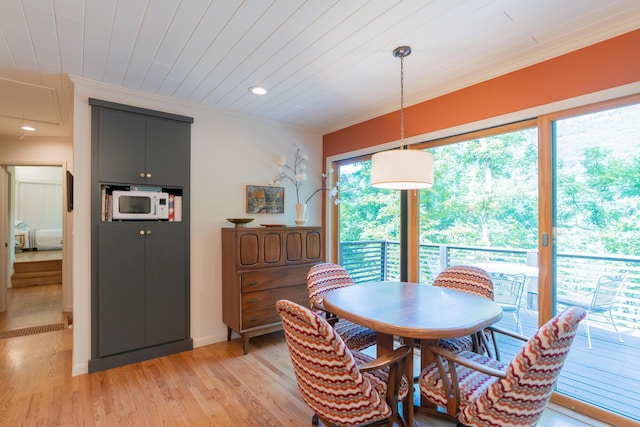 4205 Seneca Ave, Chattanooga, TN 37409 - dining area featuring light wood-style flooring, wooden ceiling, crown molding, and recessed lighting
