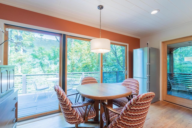 4205 Seneca Ave, Chattanooga, TN 37409 - dining room featuring light wood-type flooring and healthy amount of natural light