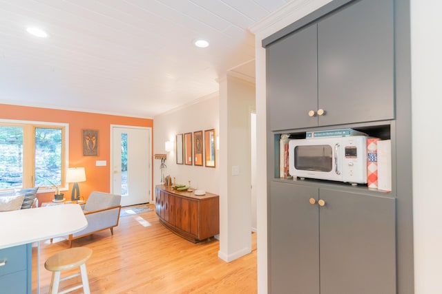 4205 Seneca Ave, Chattanooga, TN 37409 - kitchen with crown molding, light wood finished floors, gray cabinets, recessed lighting, and light countertops
