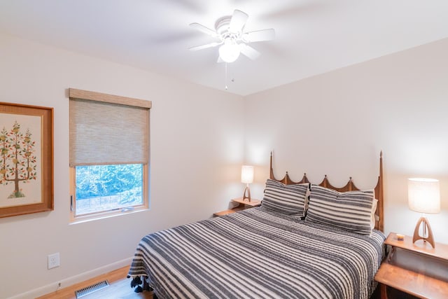 4205 Seneca Ave, Chattanooga, TN 37409 - bedroom with wood finished floors and ceiling fan