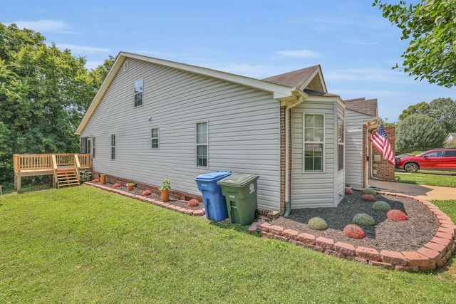 6661 Hickory Trace Cir, Chattanooga, TN 37421 - view of side of home featuring a lawn and a wooden deck