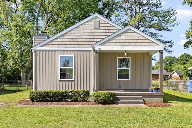5014 Carolyn Ln, Chattanooga, TN 37411 - view of front of home with a chimney and covered porch