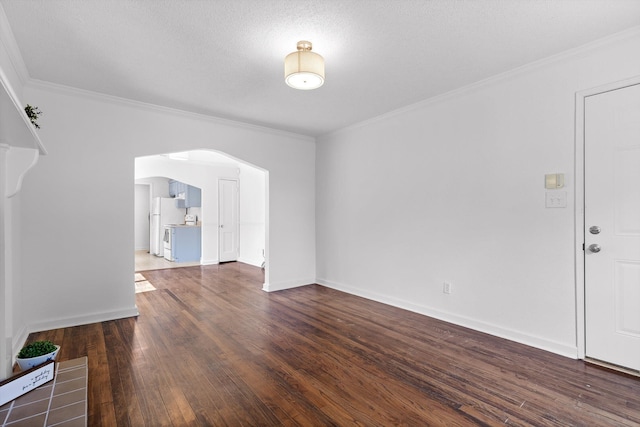 5014 Carolyn Ln, Chattanooga, TN 37411 - unfurnished living room featuring arched walkways, crown molding, and wood finished floors