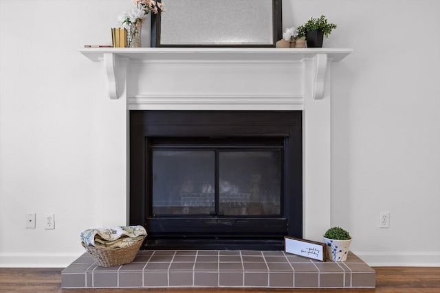 5014 Carolyn Ln, Chattanooga, TN 37411 - detailed view of a tiled fireplace and wood finished floors