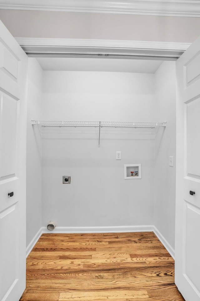 5586 Crooked Creek Dr, Ooltewah, TN 37363 - laundry area with hookup for an electric dryer, wood finished floors, and hookup for a washing machine