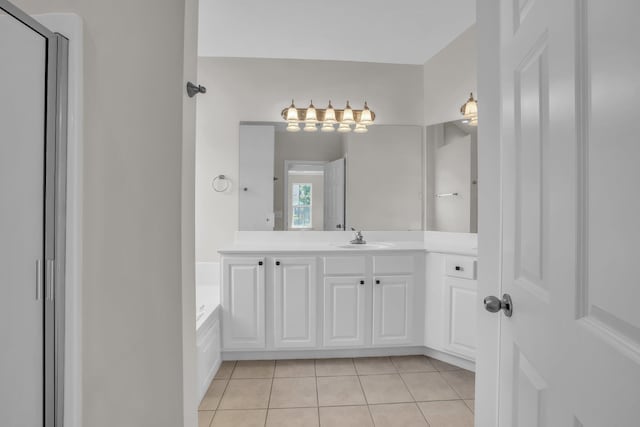 5586 Crooked Creek Dr, Ooltewah, TN 37363 - full bath featuring tile patterned flooring, vanity, a garden tub, and a shower with door