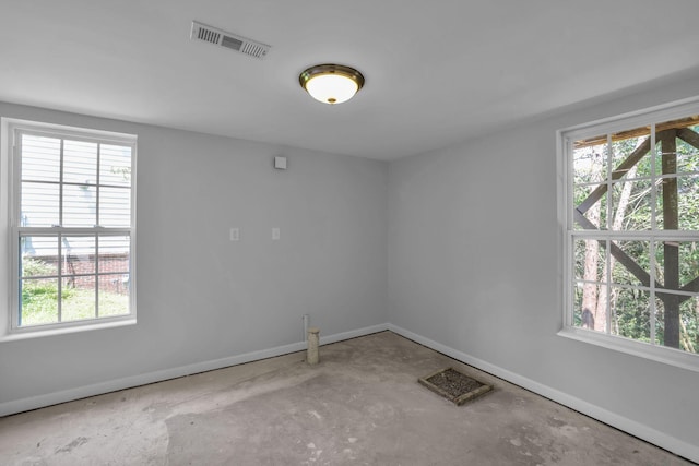 5586 Crooked Creek Dr, Ooltewah, TN 37363 - empty room with baseboards and unfinished concrete flooring