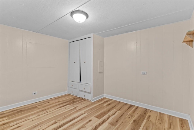 4621 Bramblett Dr SE, Dalton, GA 30721 - unfurnished room featuring wood finished floors and a textured ceiling