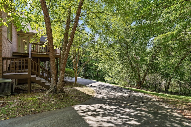 9539 Shadow Crossing Ln, Chattanooga, TN 37421 - view of yard with a deck, stairs, and driveway