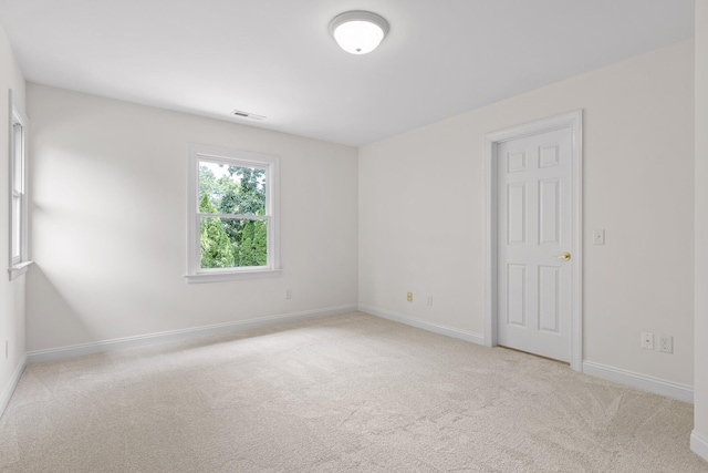 9539 Shadow Crossing Ln, Chattanooga, TN 37421 - spare room featuring light colored carpet and baseboards
