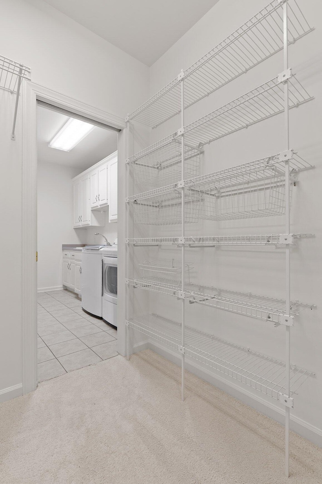 9539 Shadow Crossing Ln, Chattanooga, TN 37421 - storage area with washing machine and clothes dryer and a sink